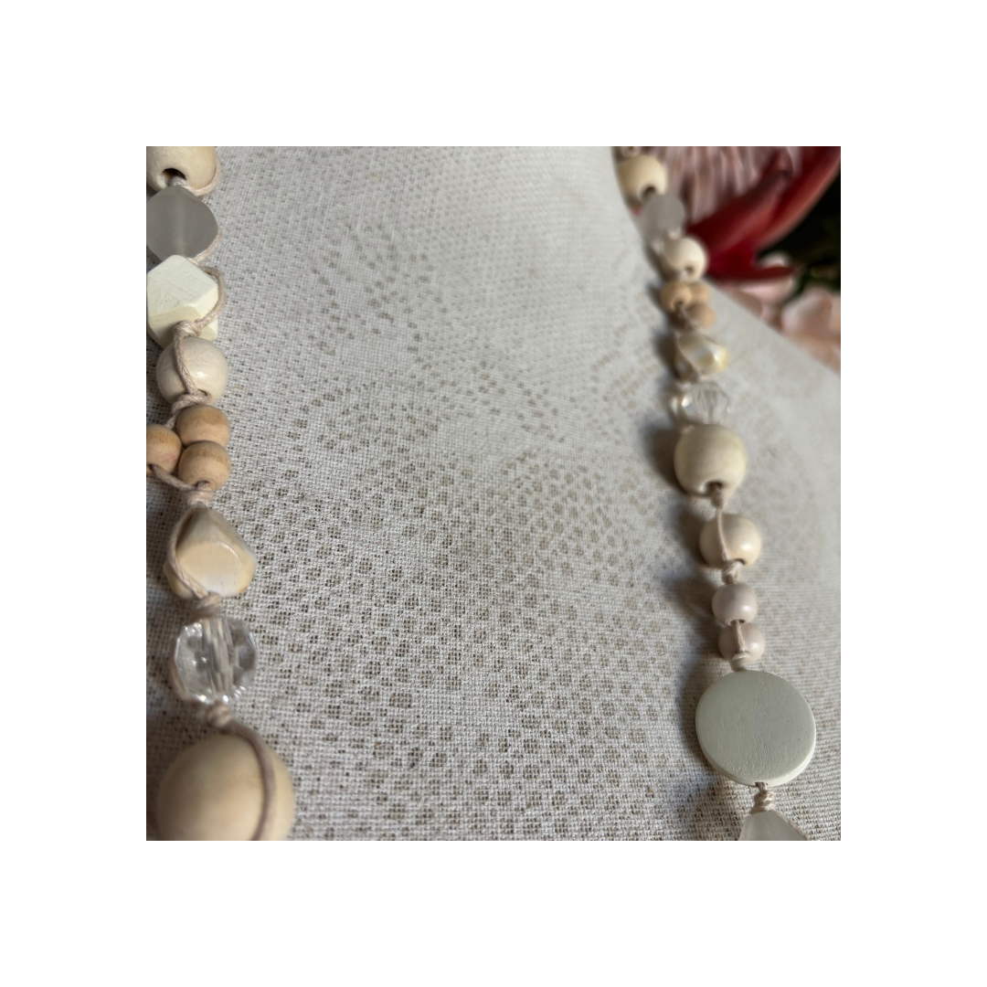 Necklace Knotted with Soft Cream Beads